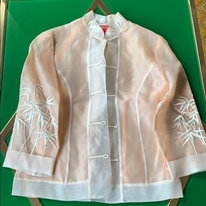 Shanghai Tang silk top in peach and cream.